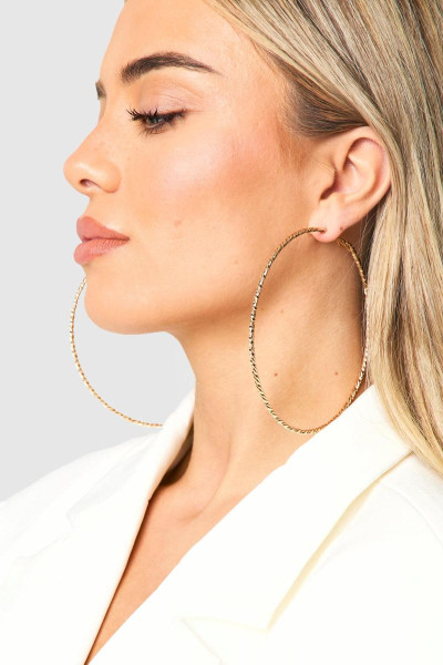 Великі кручені сережки-кільця