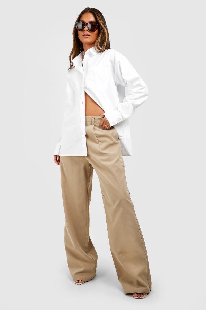 Біла велика сорочка з кишенями