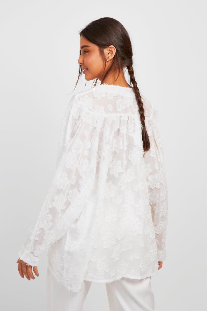 Кремова сорочка вільного крою