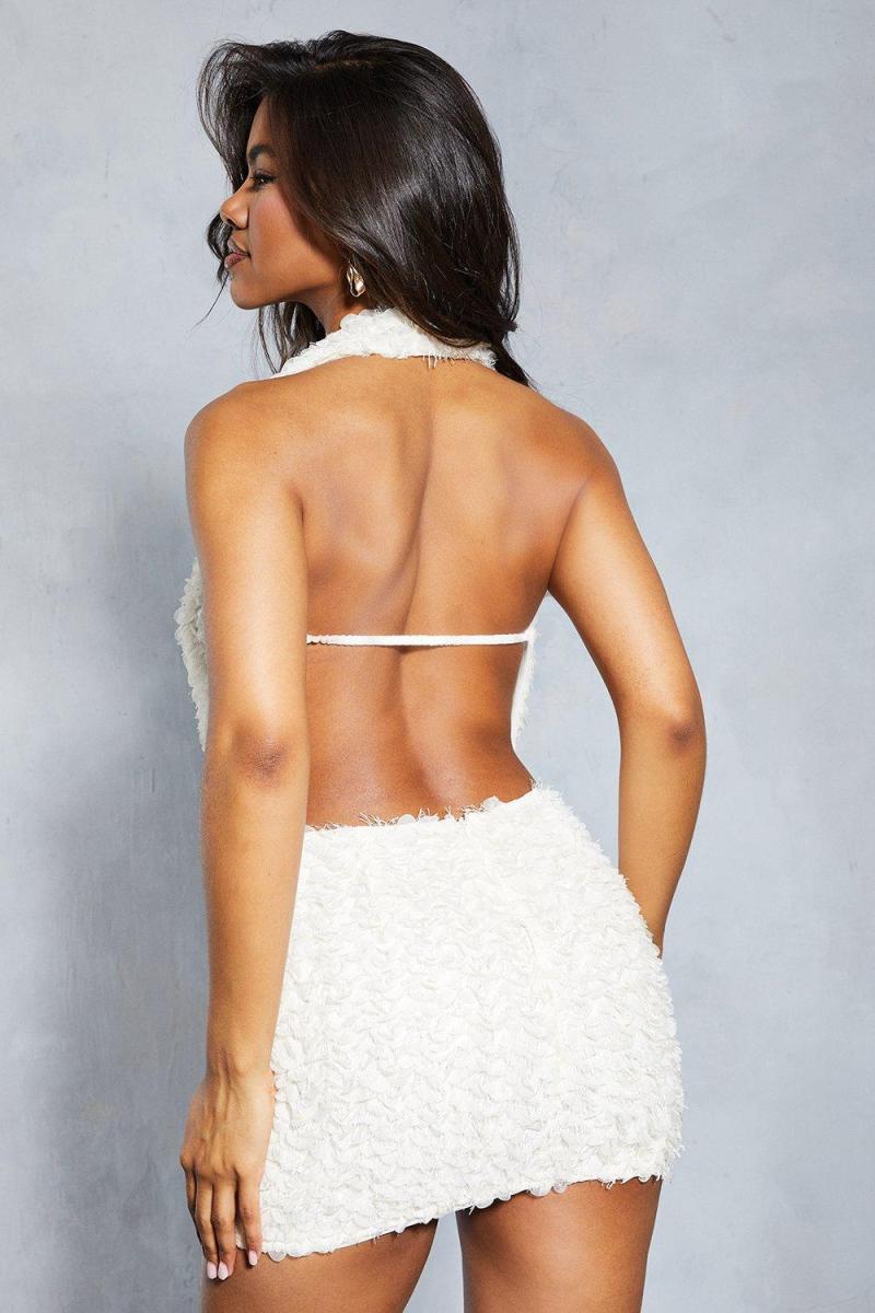 Текстурована міні -спідниця з високою талією