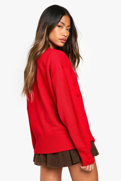 Величезний джемпер з різдвяним бантом