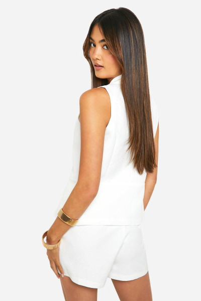 Довгий жилет із розділеним подолом