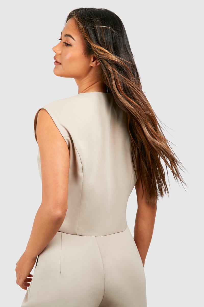 Асиметричний жилет на ґудзиках