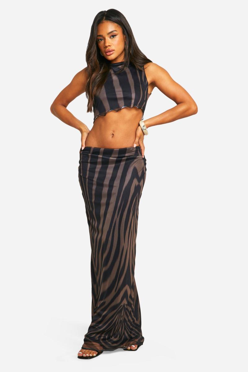 Асиметрична сітчаста максі-спідниця з принтом