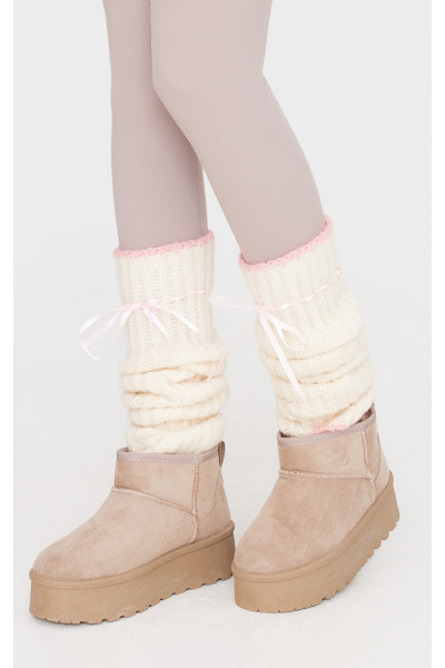 Кремові гетри з бантом вільного в’язання