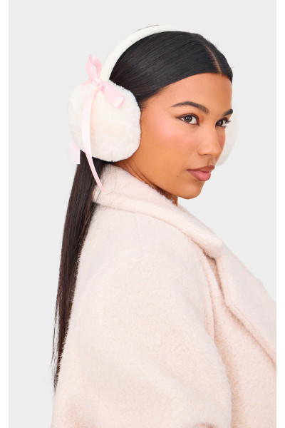 Кремові амбушюри зі штучного хутра з бантом