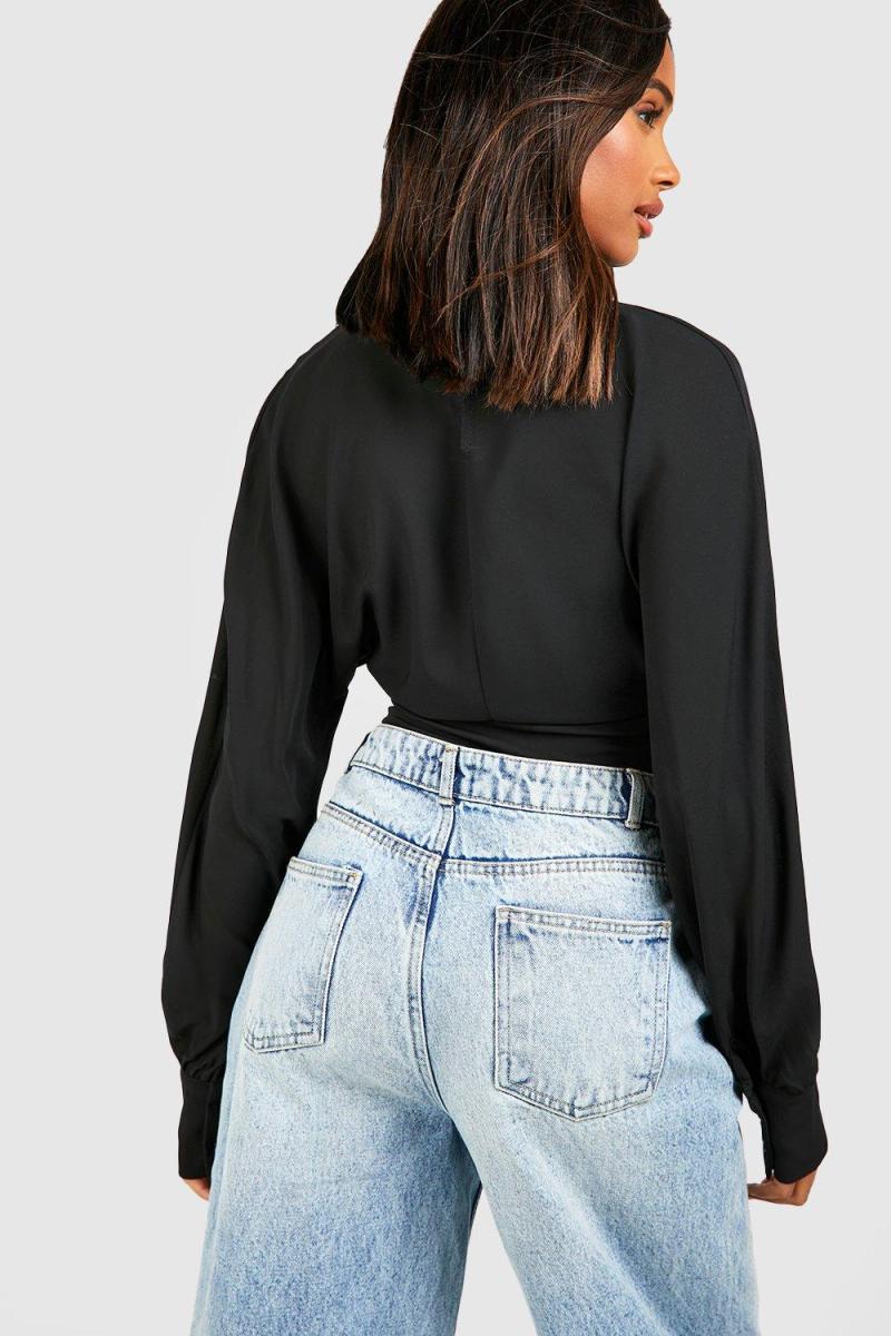 Ткана блузка з V-подібною талією з об’ємними рукавами