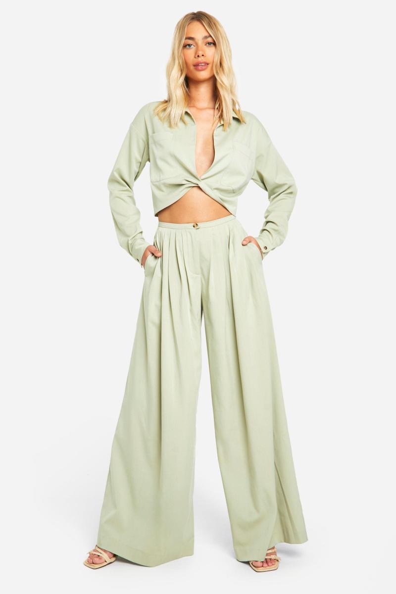 Широкі плісировані брюки з льону з низькою посадкою