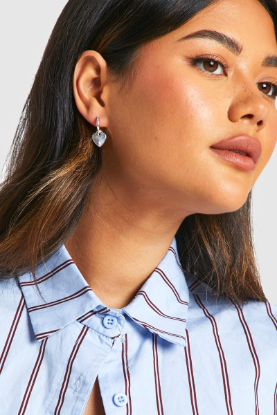 Срібні сережки-кільця у формі серця