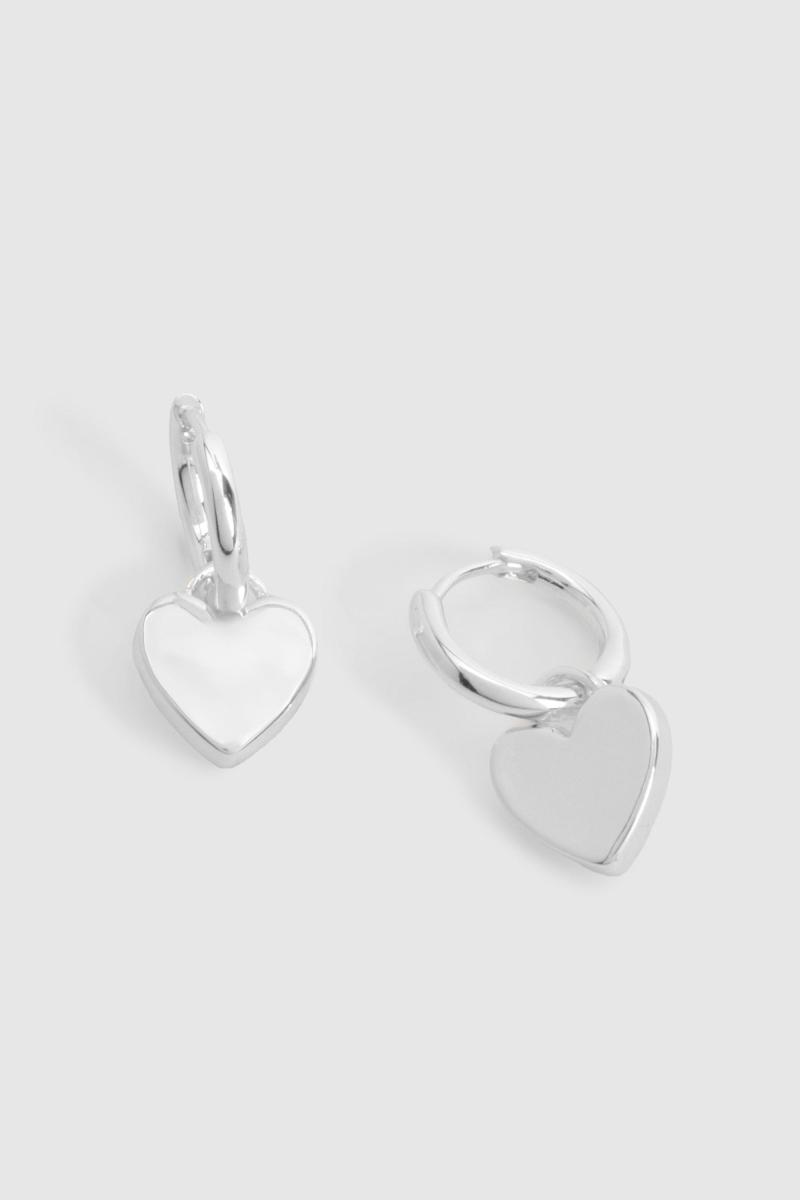 Срібні сережки-кільця у формі серця