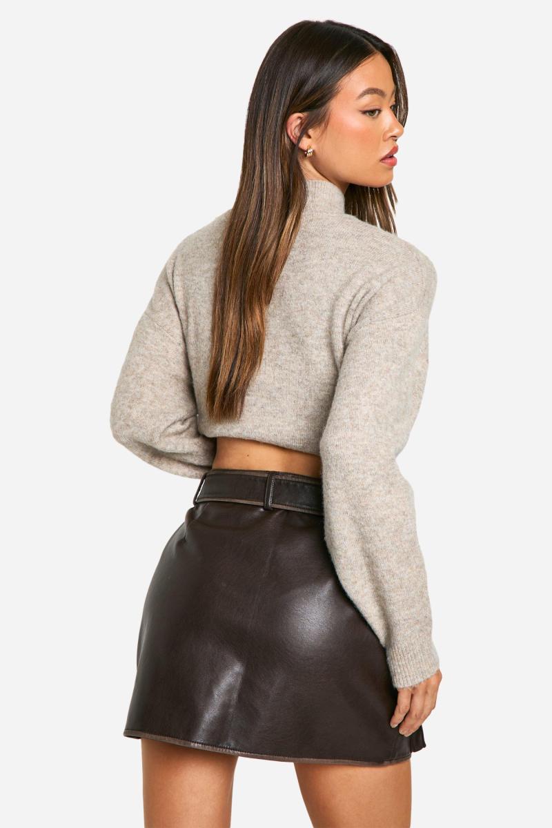 Висока міні-спідниця зі штучної шкіри з кишенями