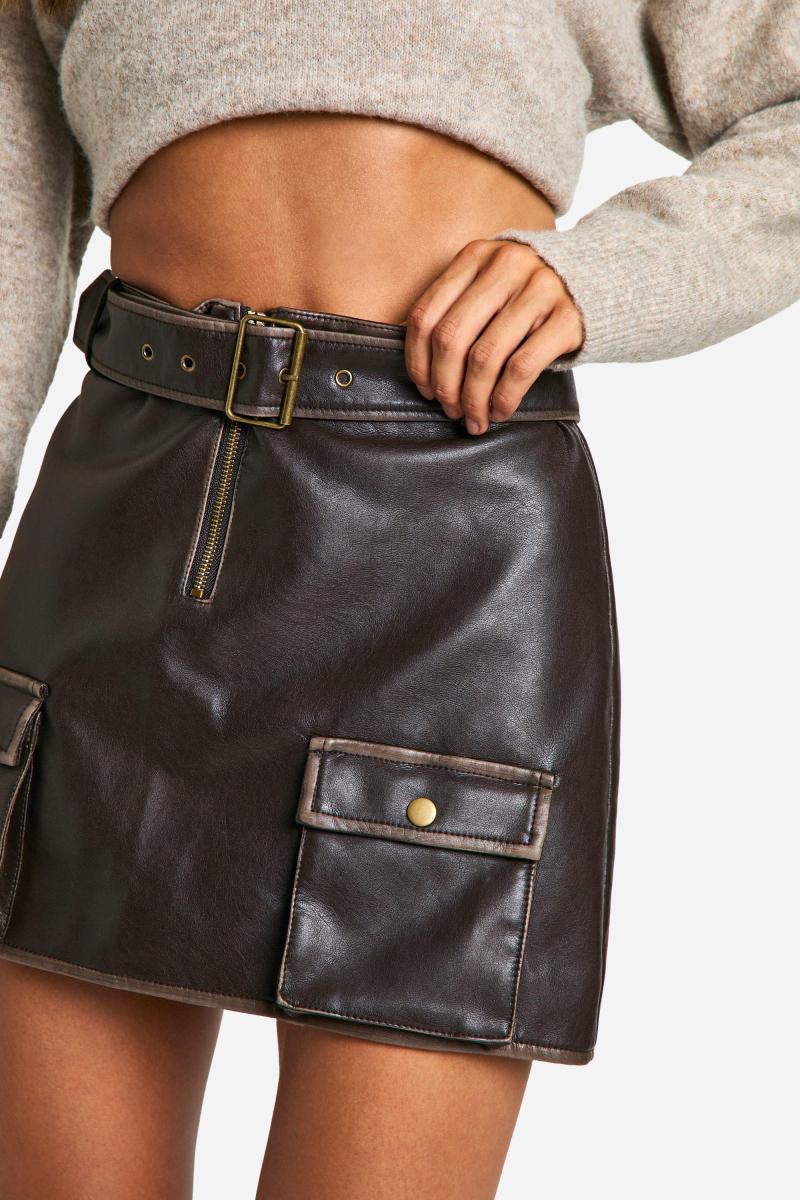 Висока міні-спідниця зі штучної шкіри з кишенями