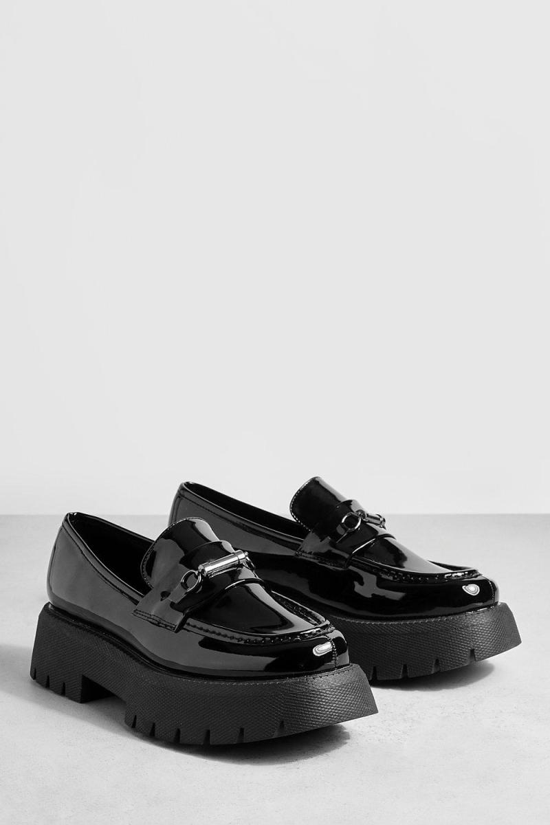 Лофери з широким кроєм на платформі та на масивній підошві