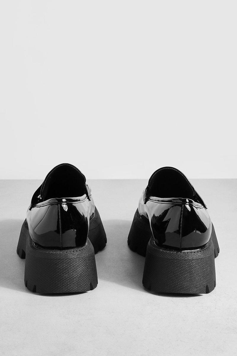 Лофери з широким кроєм на платформі та на масивній підошві