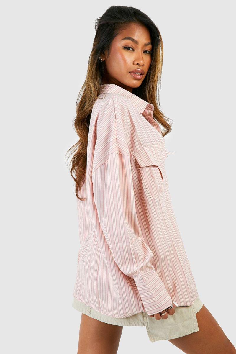 Велика сорочка з рожевою смугою та кишенями