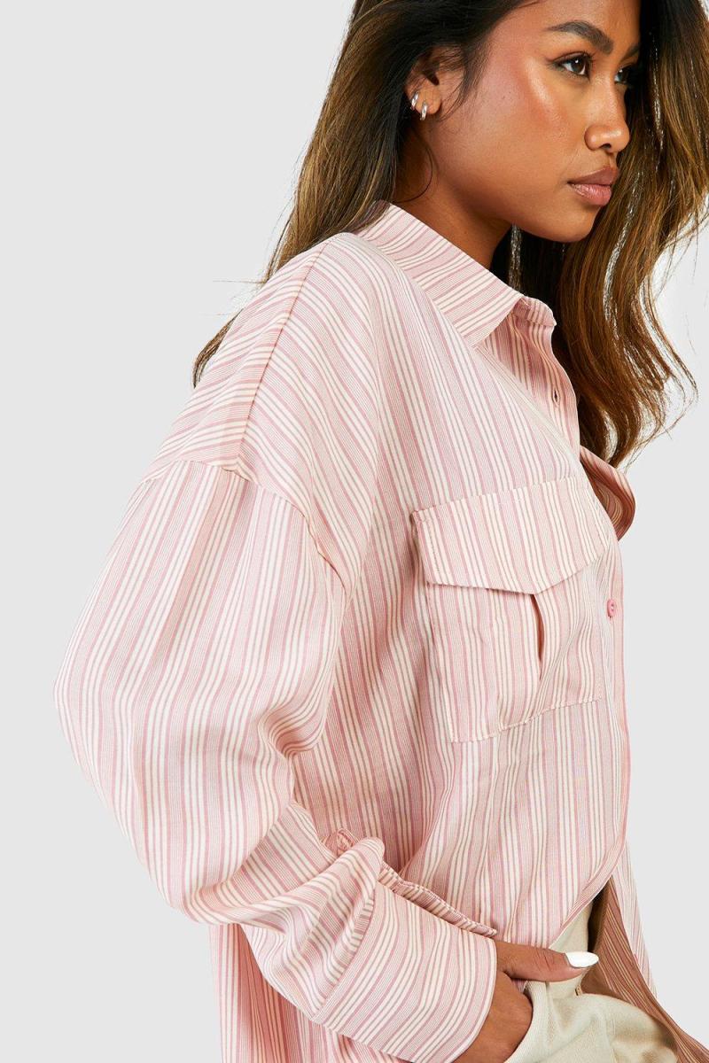 Велика сорочка з рожевою смугою та кишенями