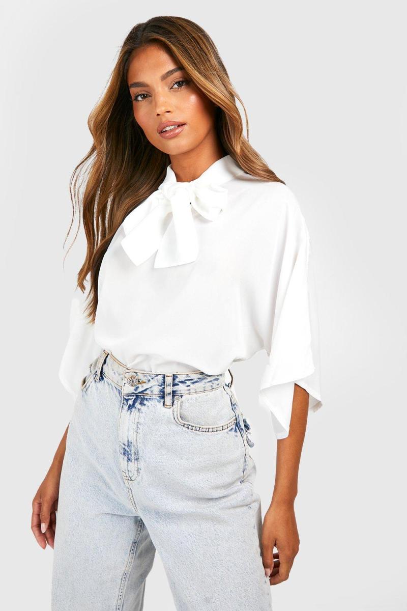 Блуза з розкльошеними рукавами кольору слонової кістки