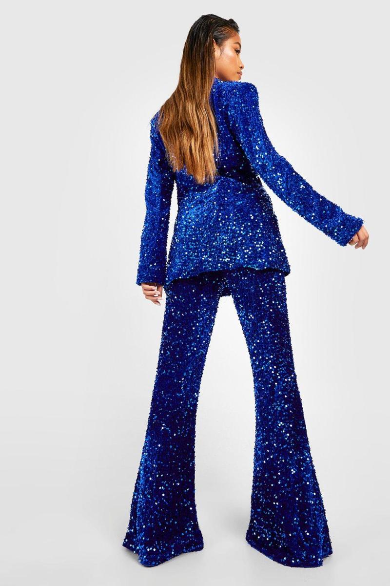 Оксамитові брюки з паєтками та кльош