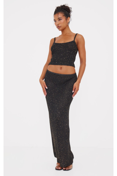 Чорна в'язана максі-спідниця з паєтками