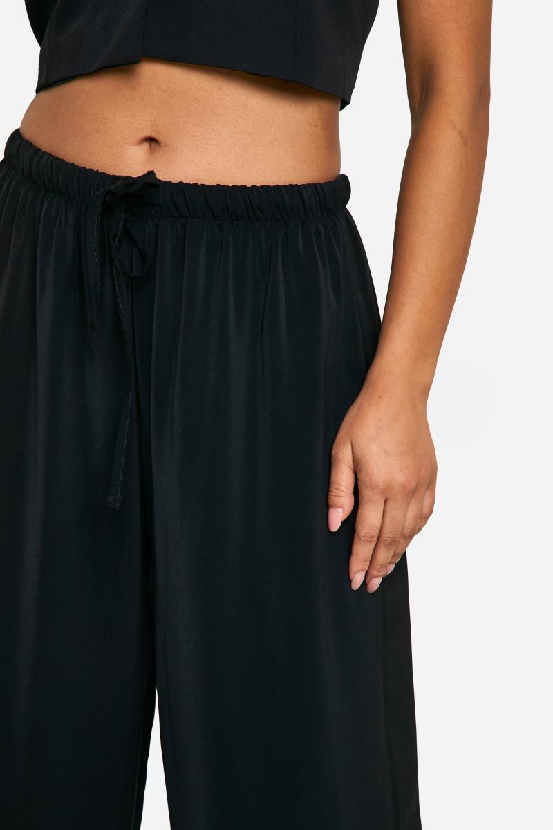 Маленькі ткані широкі штани