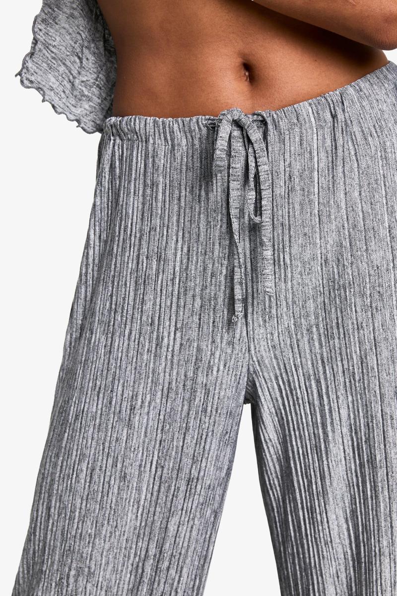 Брюки зі шнурками зі складками