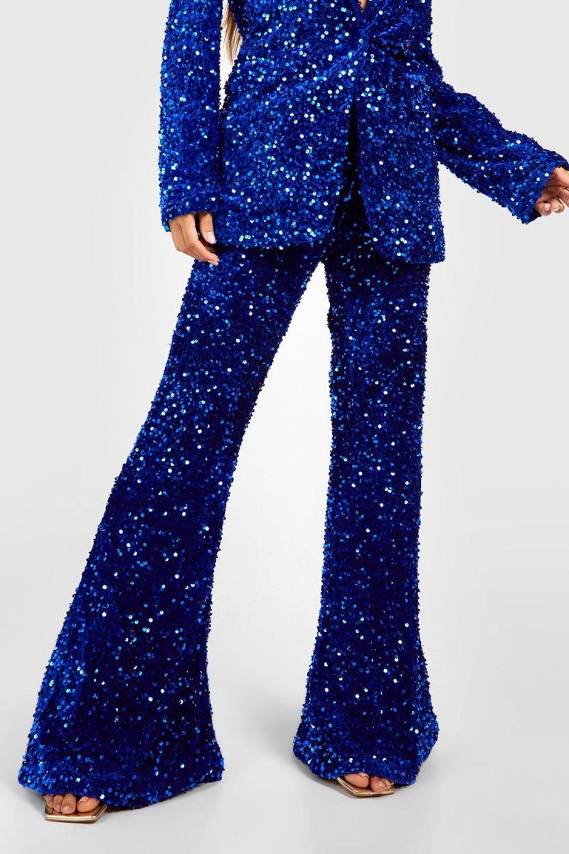 Оксамитові брюки з паєтками та кльош
