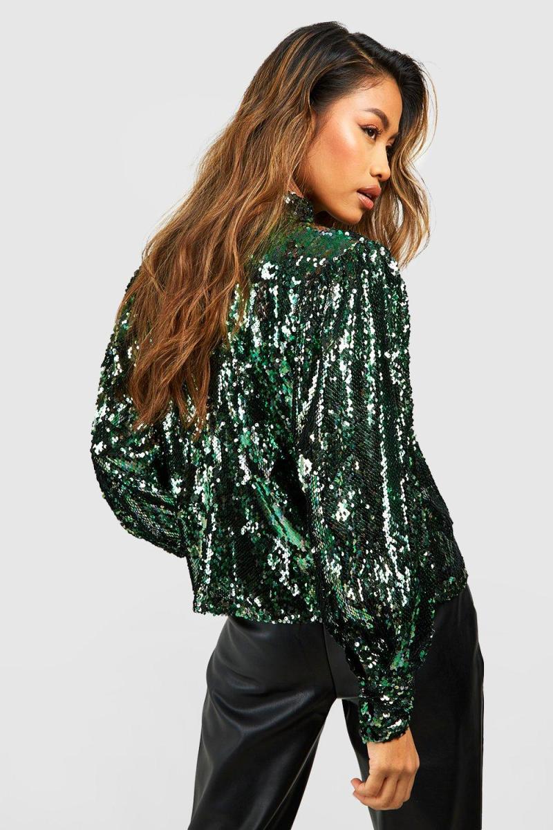 Рожевий об'ємний топ із паєтками з високим горлом