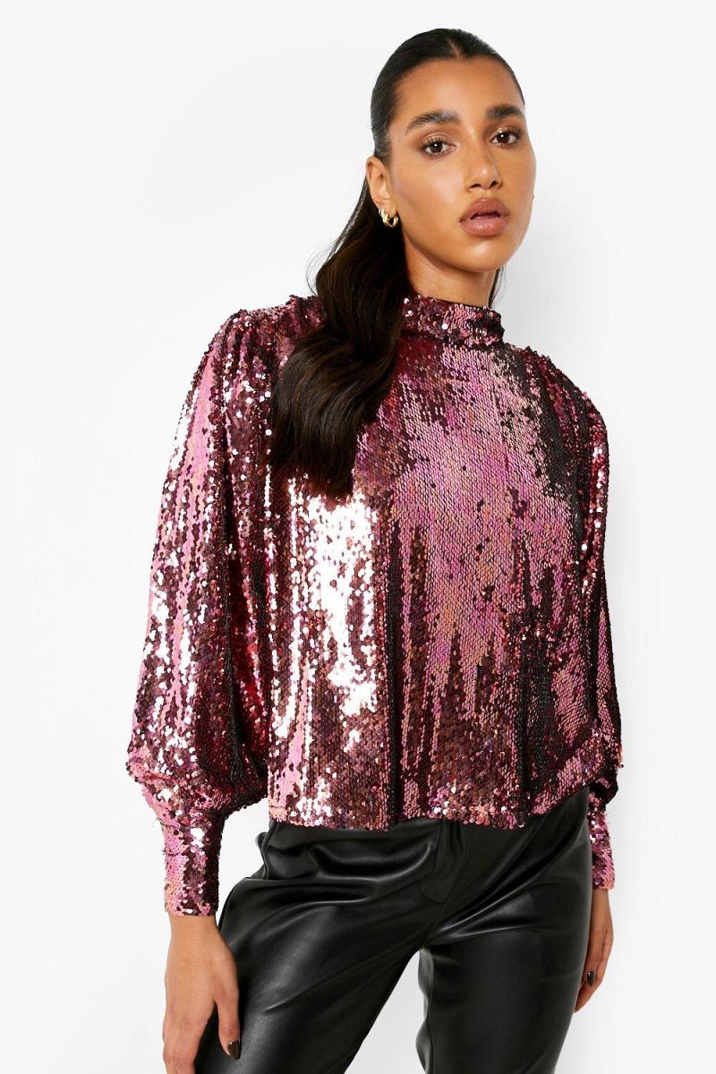 Рожевий об'ємний топ із паєтками з високим горлом