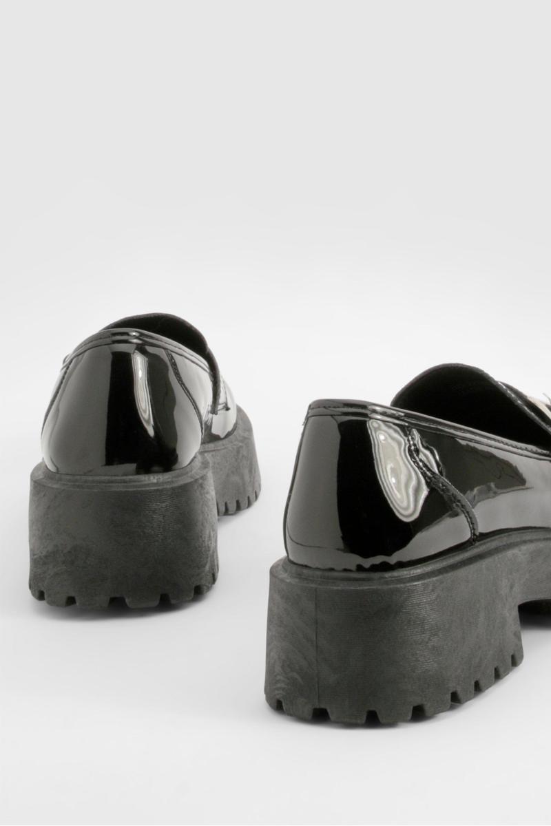 Лофери з лакованою пряжкою на масивній підошві