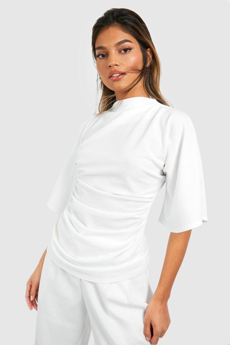 Блуза з розкльошеними рукавами з високою горловиною і крепом із джерсі