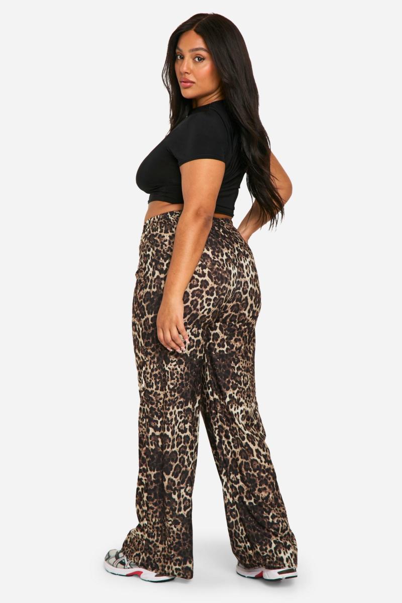 Плюс широкі трикотажні штани з леопардовим принтом