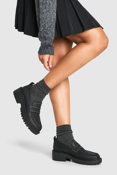 Масивні лофери з шипами