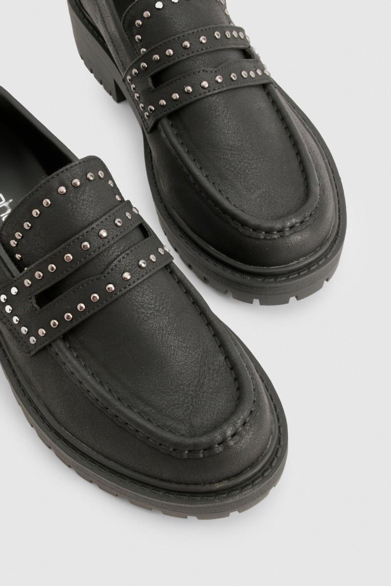 Масивні лофери з шипами