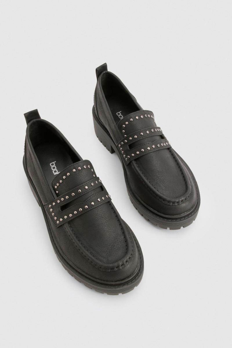 Масивні лофери з шипами