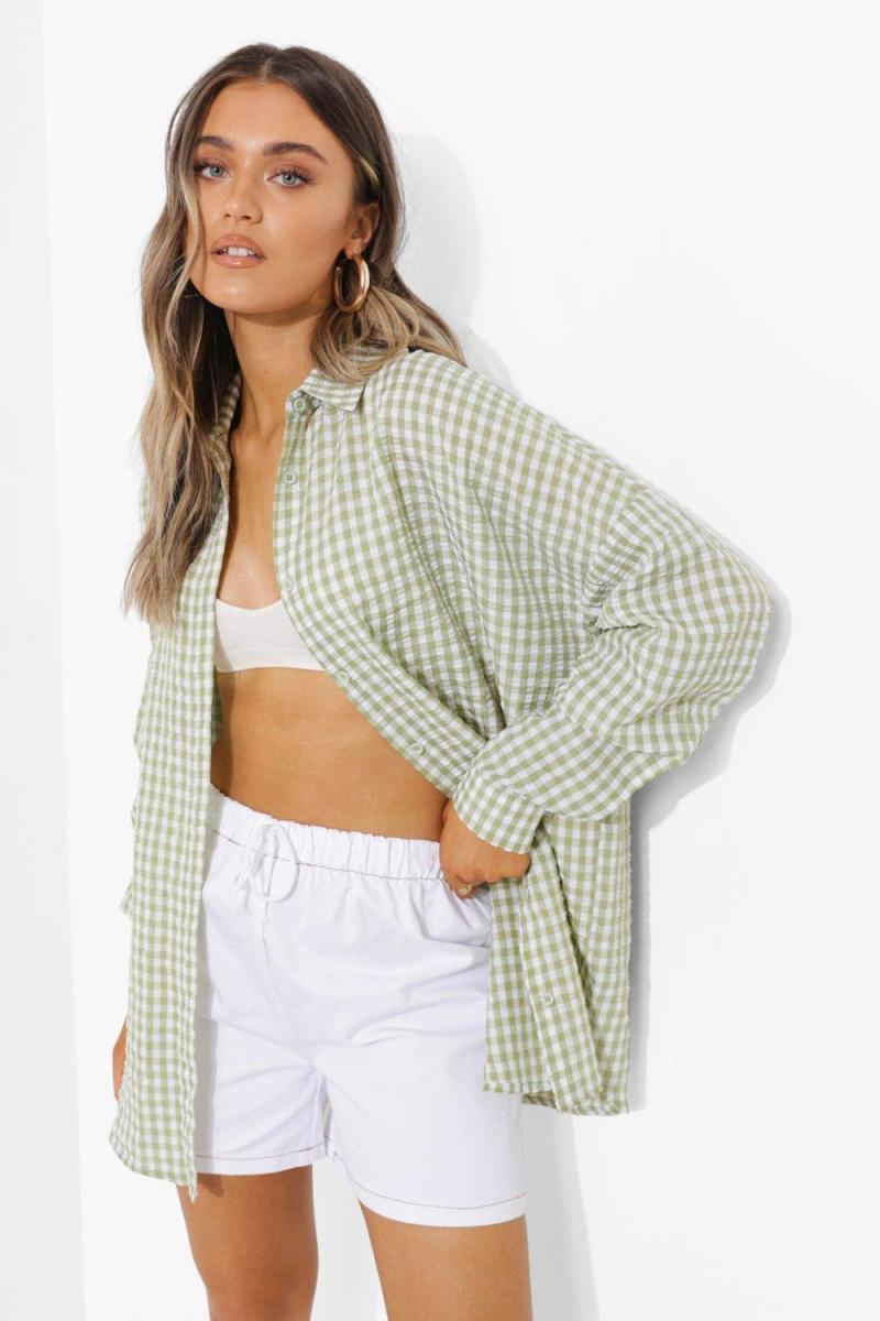 Бузкова оверсайз-сорочка в клітку