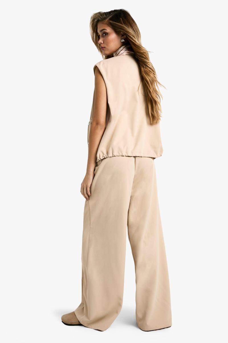 Штани з тклею з таленою талії