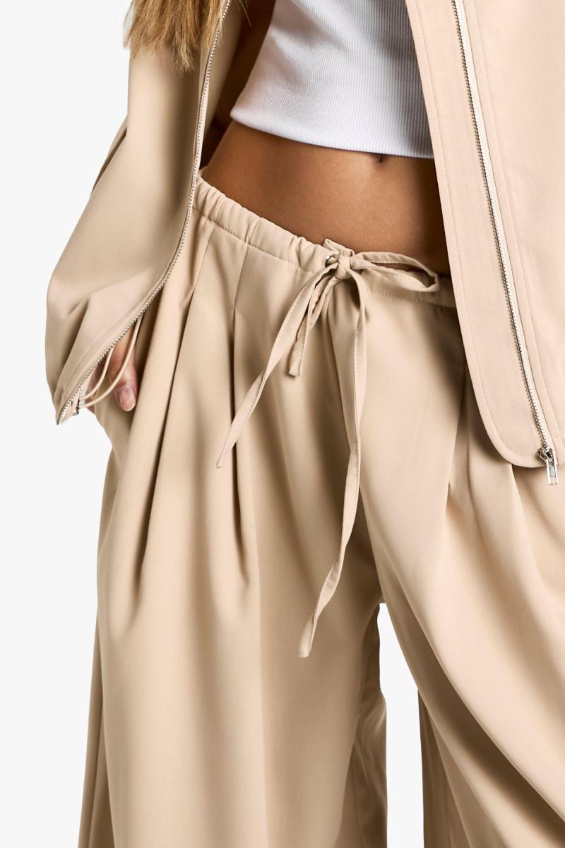 Штани з тклею з таленою талії