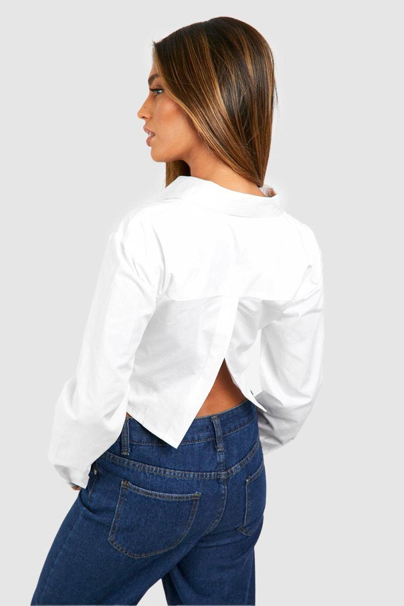 Біла коротка закручена спереду сорочка
