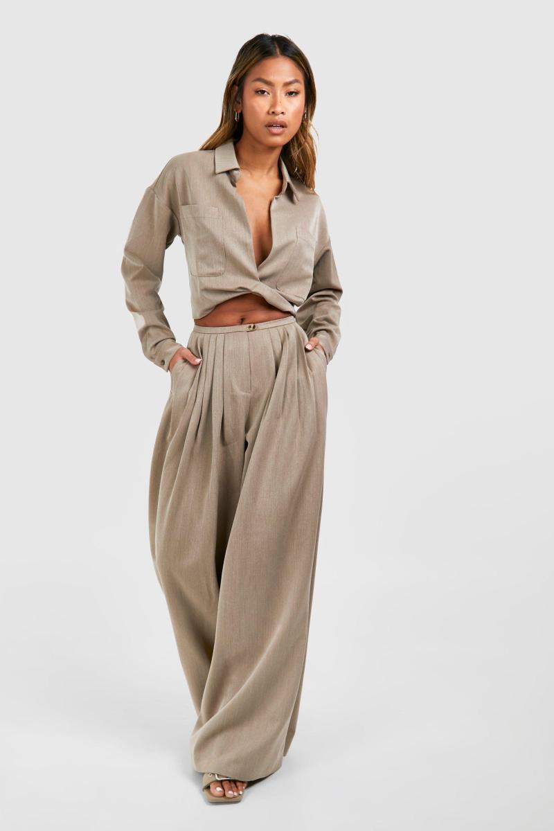 Широкі плісировані штани з низькою посадкою