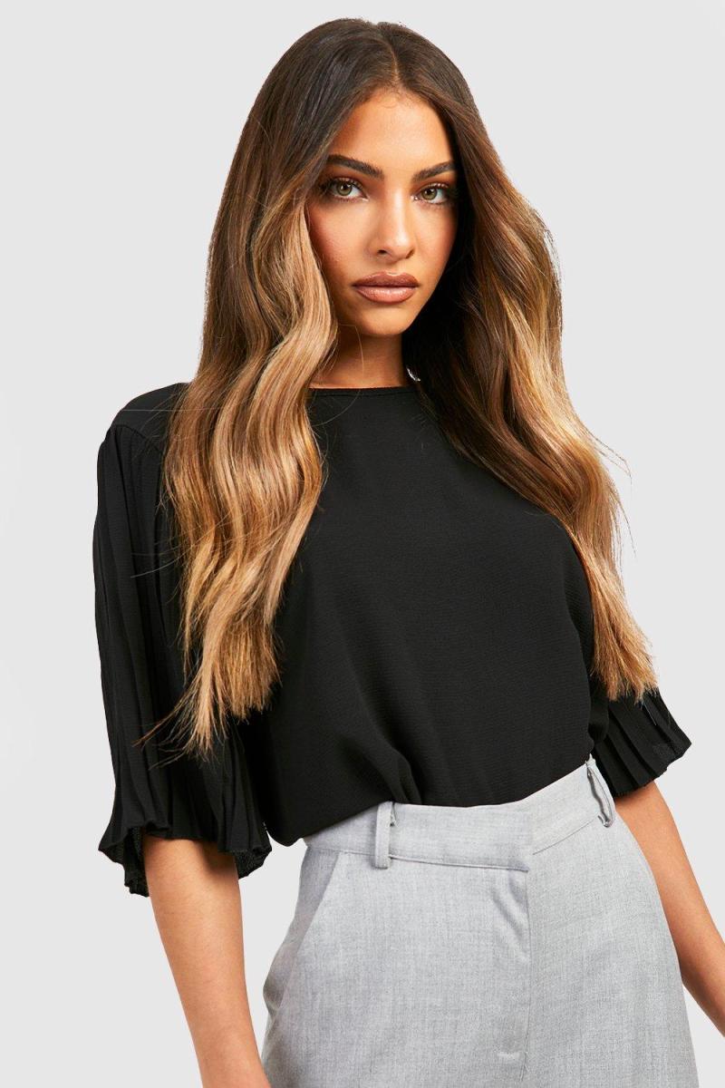 Плетена блуза кольору слонової кістки зі складками