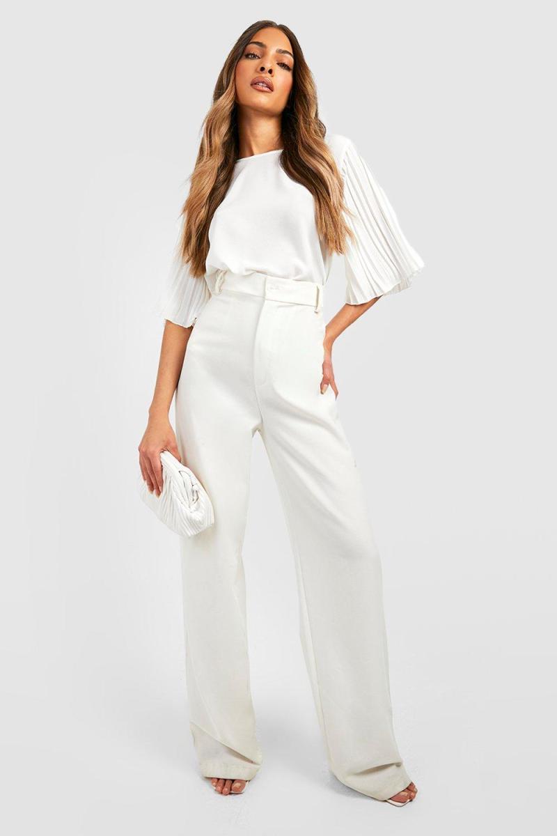 Плетена блуза кольору слонової кістки зі складками