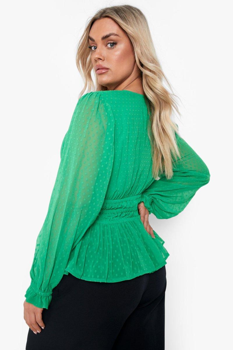 Яскраво-рожева блуза з об’ємними рукавами в сітчасту сіточку