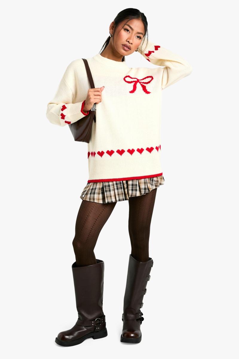 Величезний різдвяний джемпер із сердечками та бантом